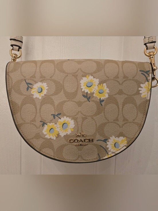 Coach Handbags - Coach Beige Daisy Saddle Crossbody Bag with Yellow Floral